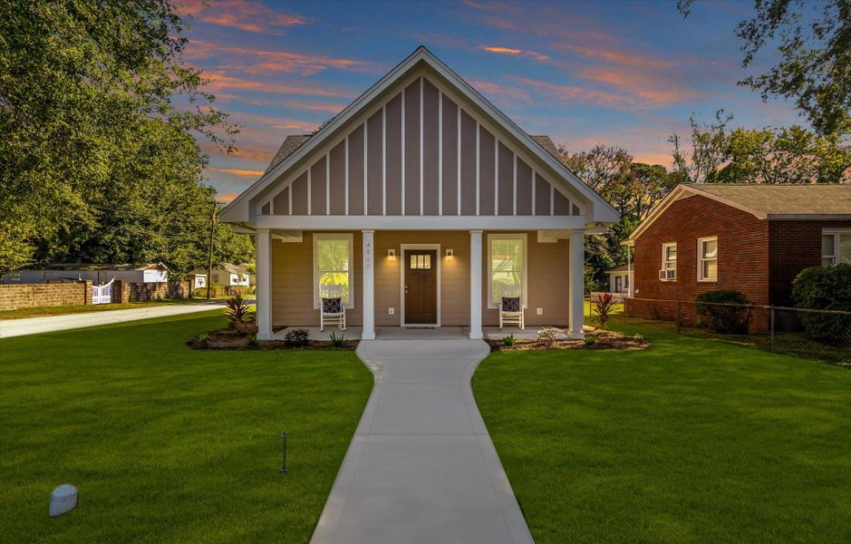 Front exterior of a new home in , North Charleston, SC, highlighting curb appeal (Image 1).
