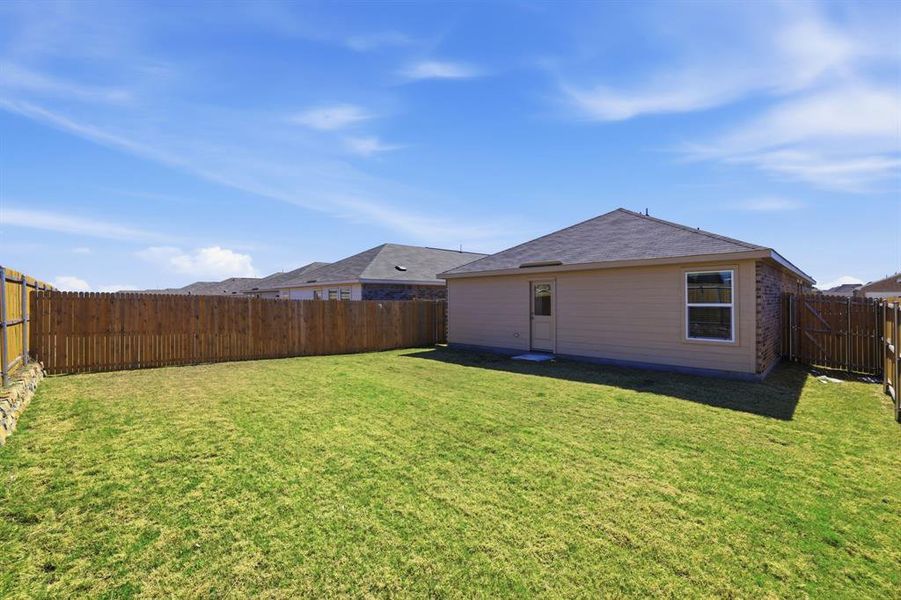 Exterior details and patio area of a home in Falcon Heights, Forney (Image 20).