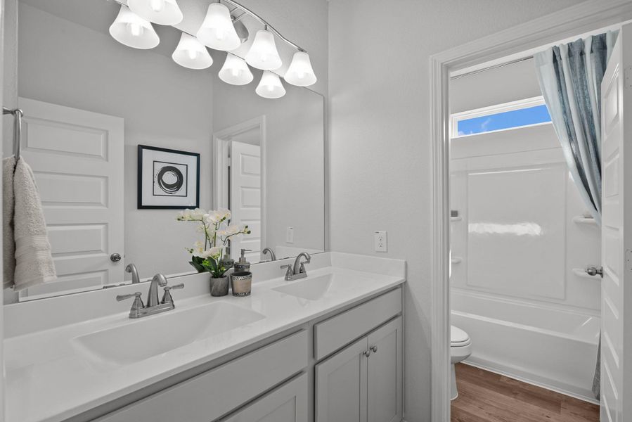 Photos shown are of a staged model home and are for illustration purposes only. Actual home features, finishes, and layout may vary.