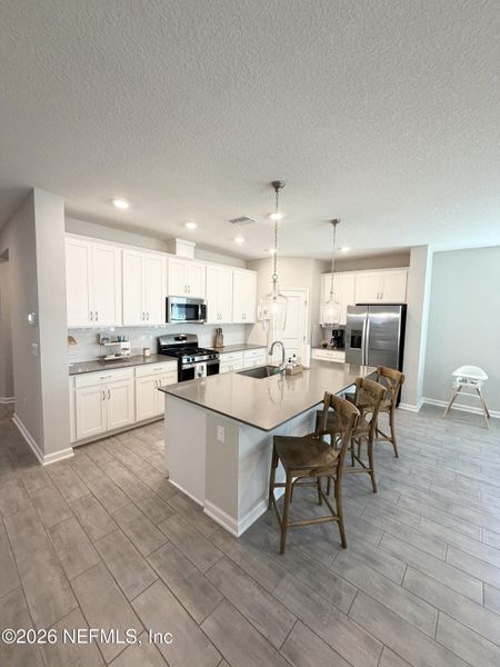 Furnished interior view inside a new home in , Yulee (Image 16).