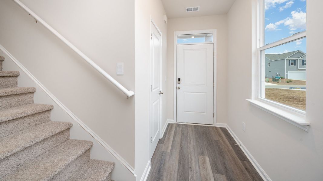 Spacious, unfurnished interior of a new home in Indigo Preserve, Leland (Image 11).