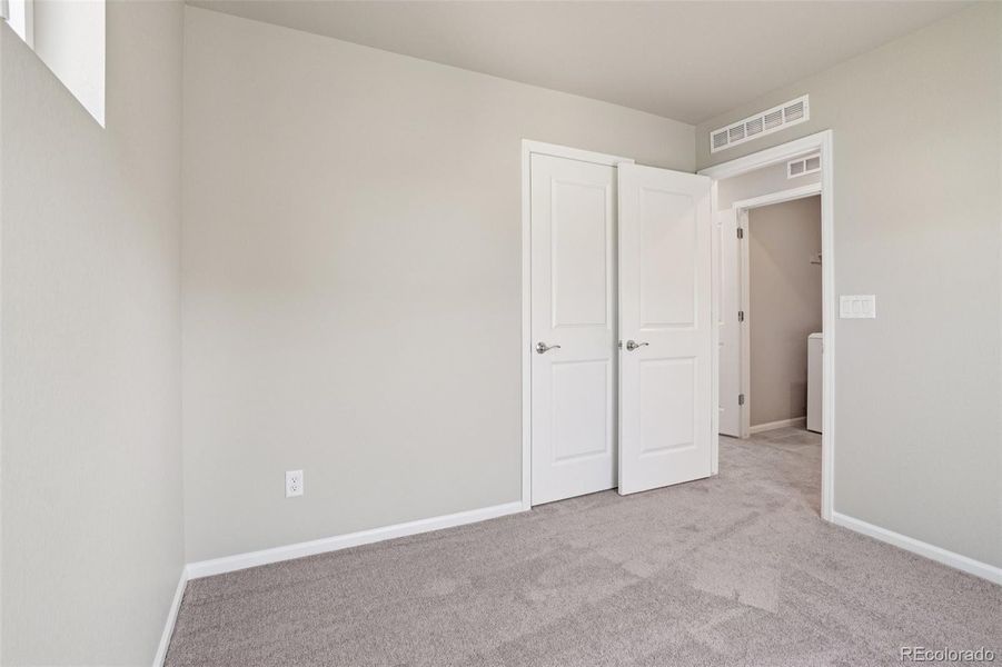 Spacious, unfurnished interior of a new home in Woodrose at Painted Prairie, Aurora (Image 21).