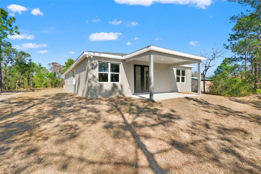 Exterior details and patio area of a home in , Citrus Springs (Image 30).