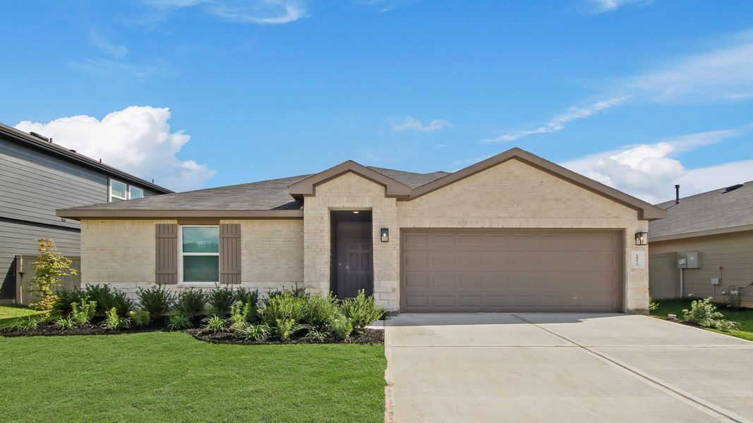 Front exterior of a new home in Harrington Trails at The Canopies, Splendora, TX, highlighting curb appeal (Image 2). Front exterior of a new home in Harrington Trails at The Canopies, Splendora, TX, highlighting curb appeal (Image 2).