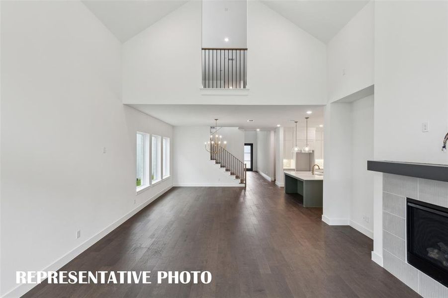 With sight lines from the front to the back of the home and an upstairs overlook, the entire family will love this over the top home!  REPRESENTATIVE PHOTO