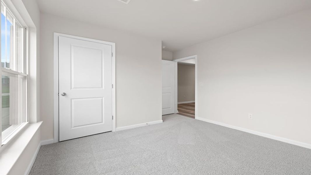Spacious, unfurnished interior of a new home in Lakestone, Woodruff (Image 14).