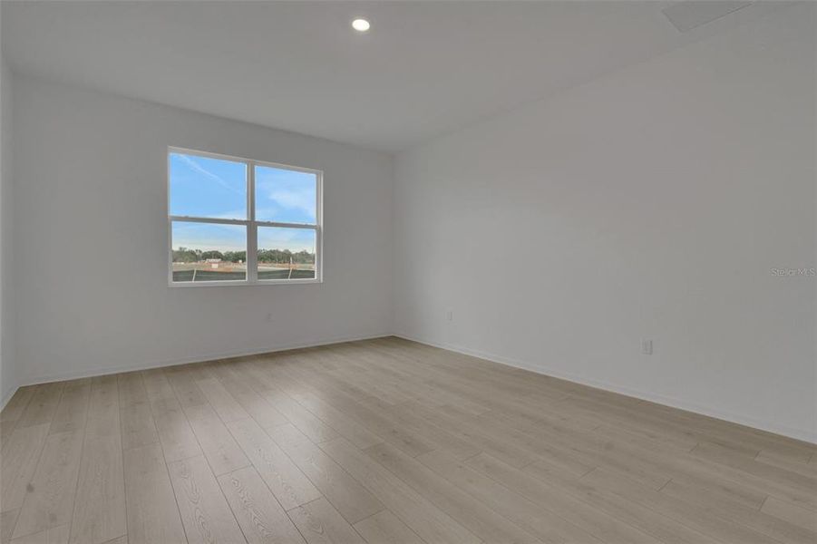 Spacious, unfurnished interior of a new home in Annabelle Estates, Winter Haven (Image 22).