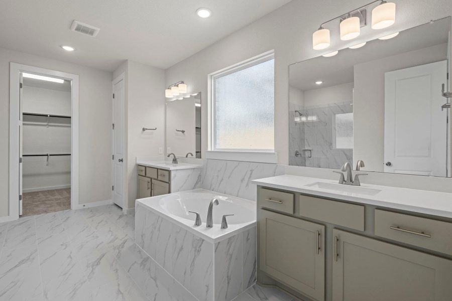 Primary Bath retreat with dual vanities & garden tub Primary Bath retreat with dual vanities & garden tub
