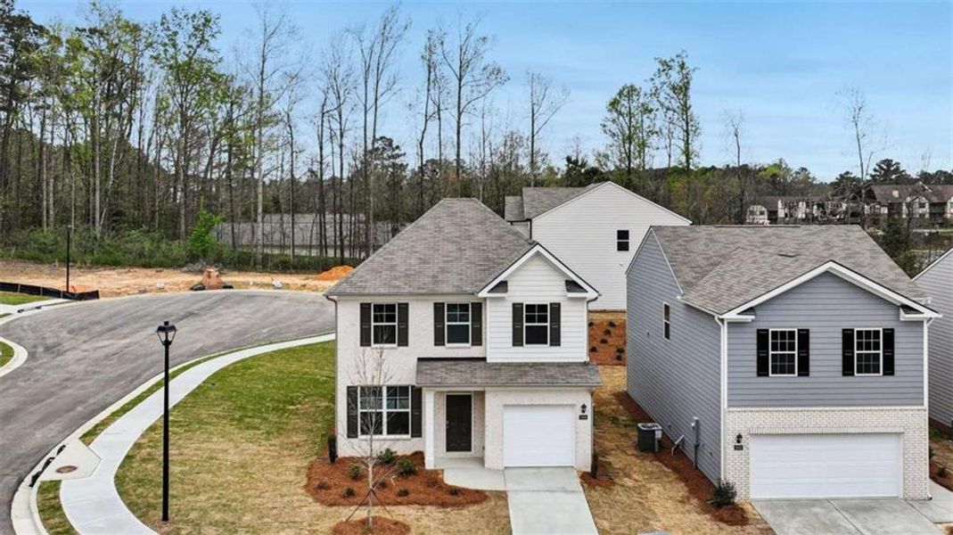 Front exterior of a new home in Sherwood Manor, College Park, GA, highlighting curb appeal (Image 18).