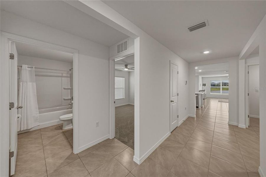 Spacious, unfurnished interior of a new home in Berry Bay, Wimauma (Image 24).