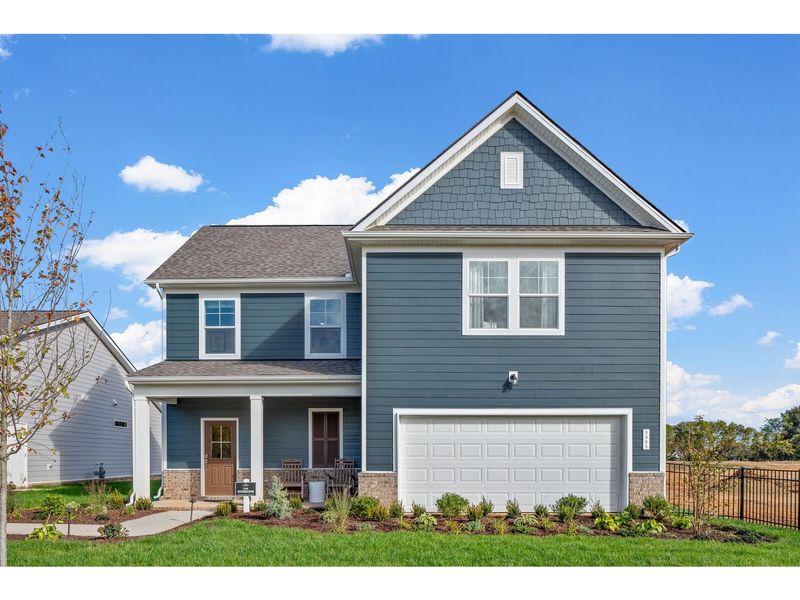 Front exterior of a new home in Sage Farms, White House, TN, highlighting curb appeal (Image 1). Front exterior of a new home in Sage Farms, White House, TN, highlighting curb appeal (Image 1).