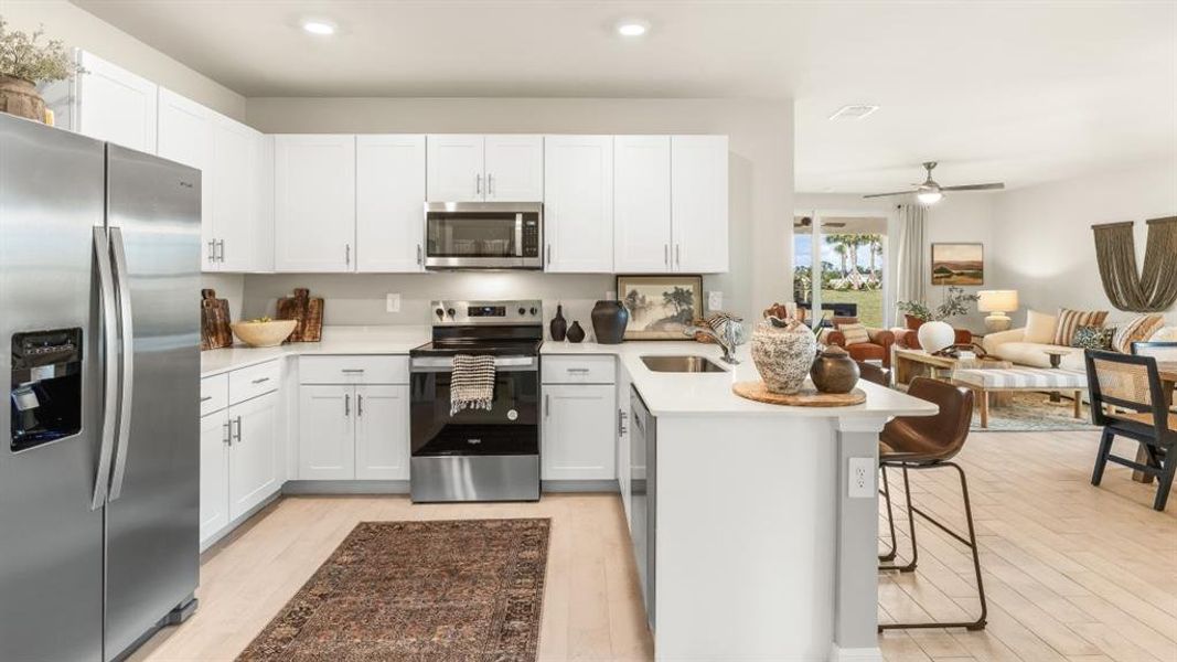 Furnished interior view inside a new home in Central Parc, North Port (Image 13).