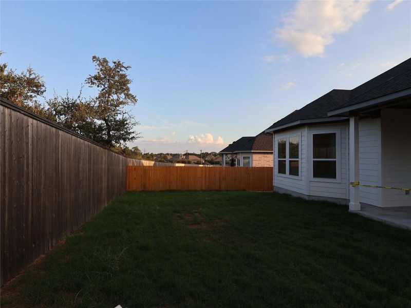 Exterior details and patio area of a home in Cedar Brook, Leander (Image 20).
