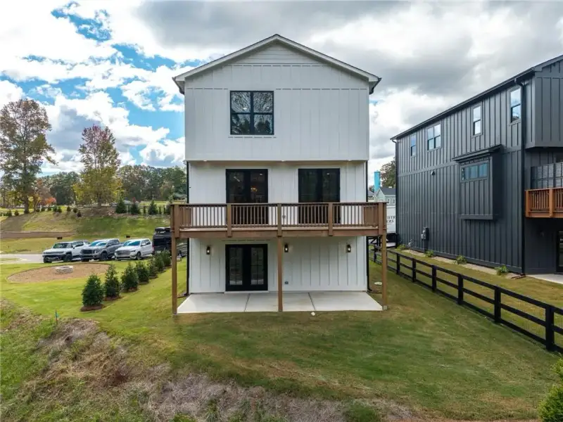 Front exterior of a new home in , Ball Ground, GA, highlighting curb appeal (Image 28).