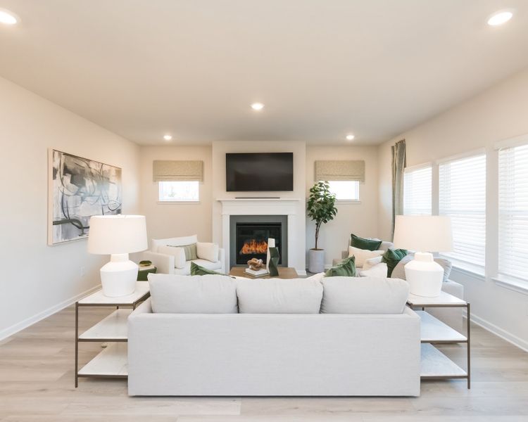 Relax by the fireplace and enjoy a movie night in the living room.