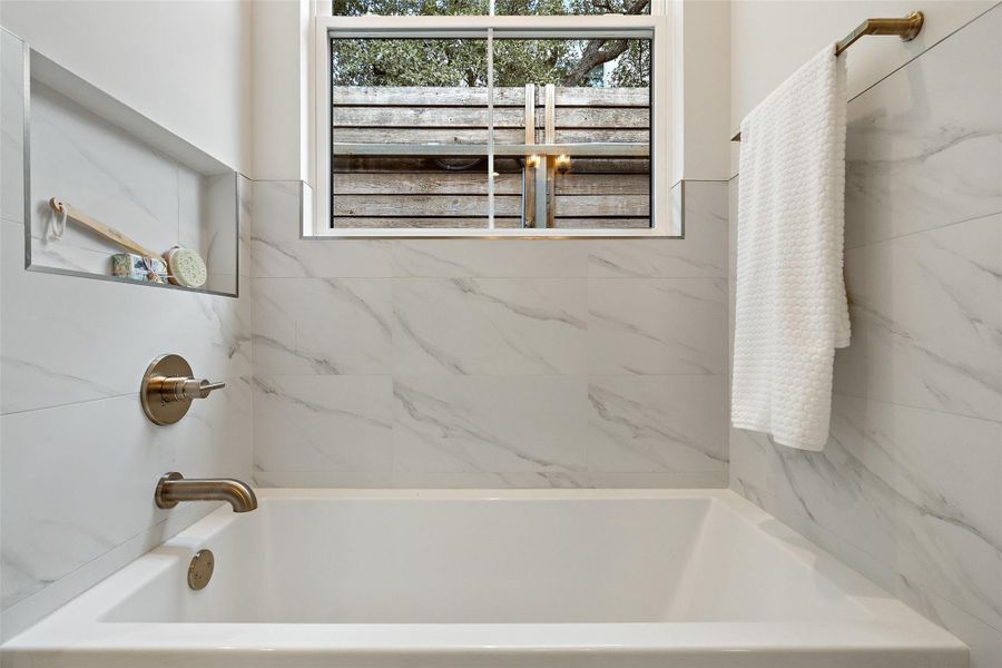 Bathroom featuring shower / bathtub combination