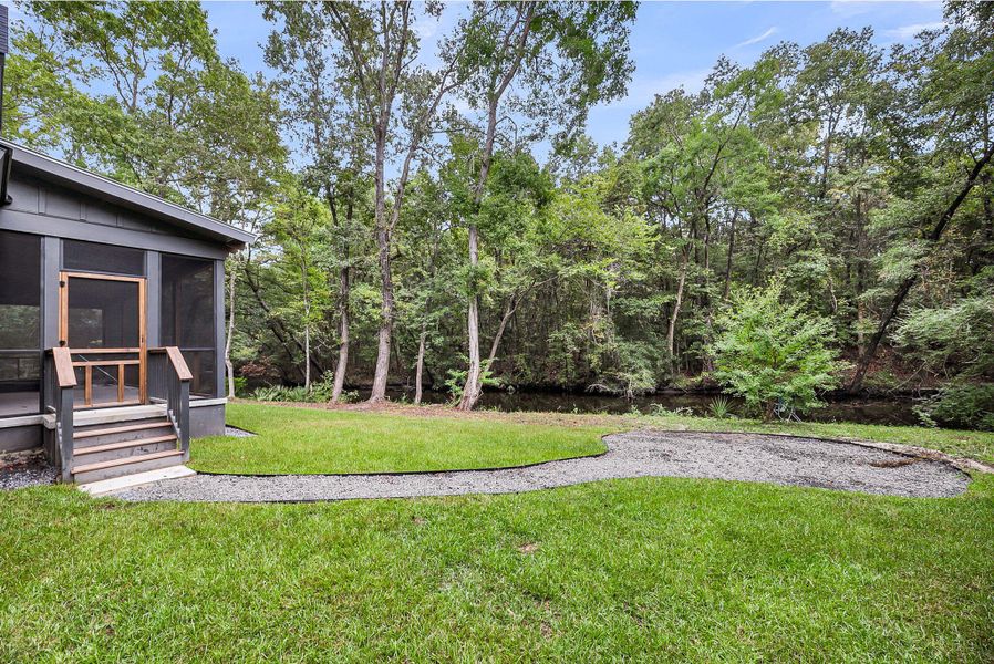 Exterior details and patio area of a home in , Johns Island (Image 33).