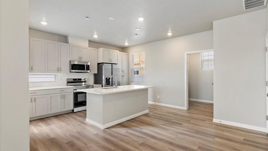 Furnished interior view inside a new home in Reunion, Commerce City (Image 5).