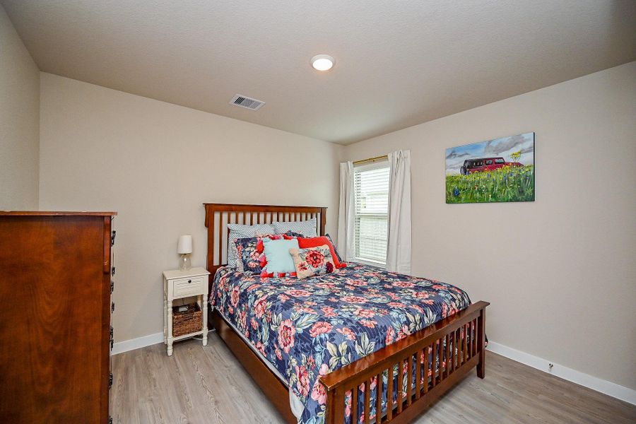 Furnished interior view inside a new home in Mustang Crossing, Alvin (Image 13).