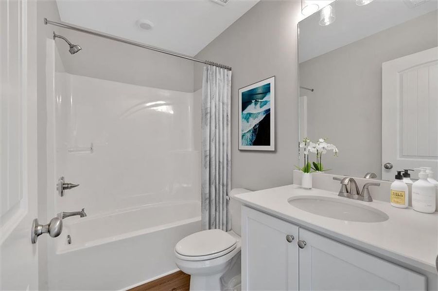 Furnished interior view inside a new home in Heritage Pointe at The Georgian, Villa Rica (Image 29).
