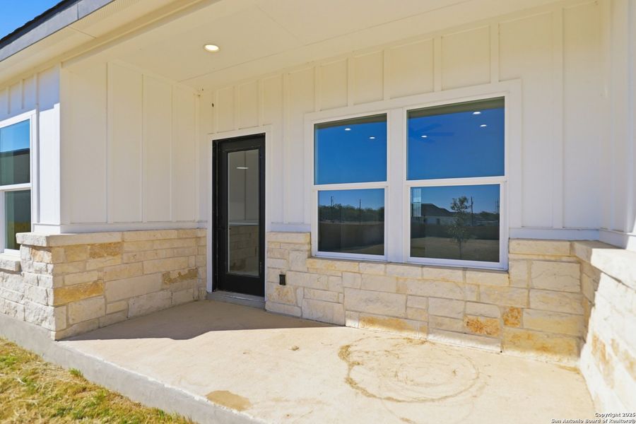 Exterior details and patio area of a home in , Atascosa (Image 24).