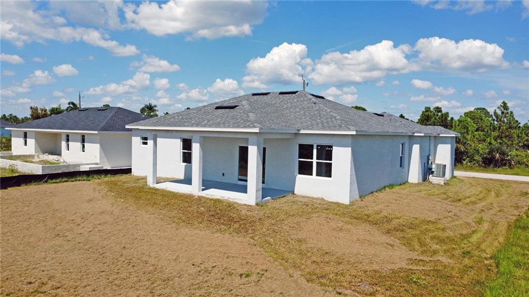 Exterior details and patio area of a home in , Port Charlotte (Image 2).