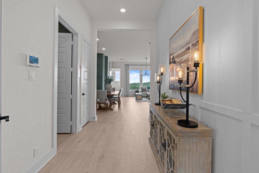 Furnished interior view inside a new home in Centero at Stone Oak, San Antonio (Image 8).
