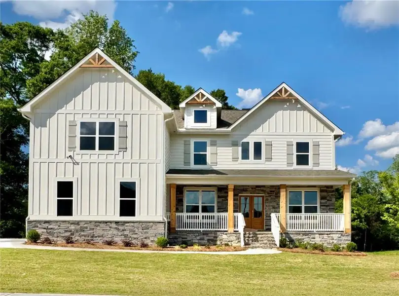 Front exterior of a home in the SteepleChase community, located in Hoschton, GA (Image 15).