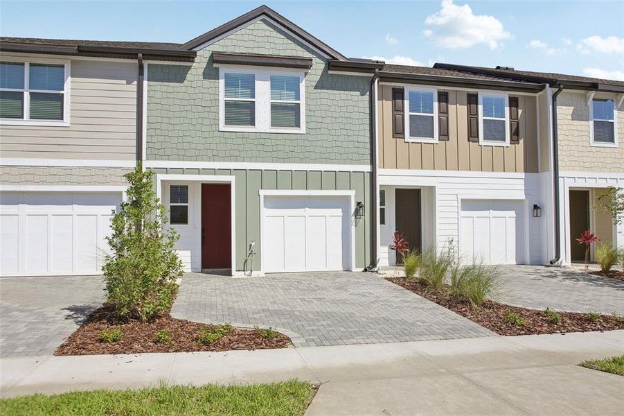 Front exterior of a new home in Montague Chase, Tampa, FL, highlighting curb appeal (Image 1). Front exterior of a new home in Montague Chase, Tampa, FL, highlighting curb appeal (Image 1).