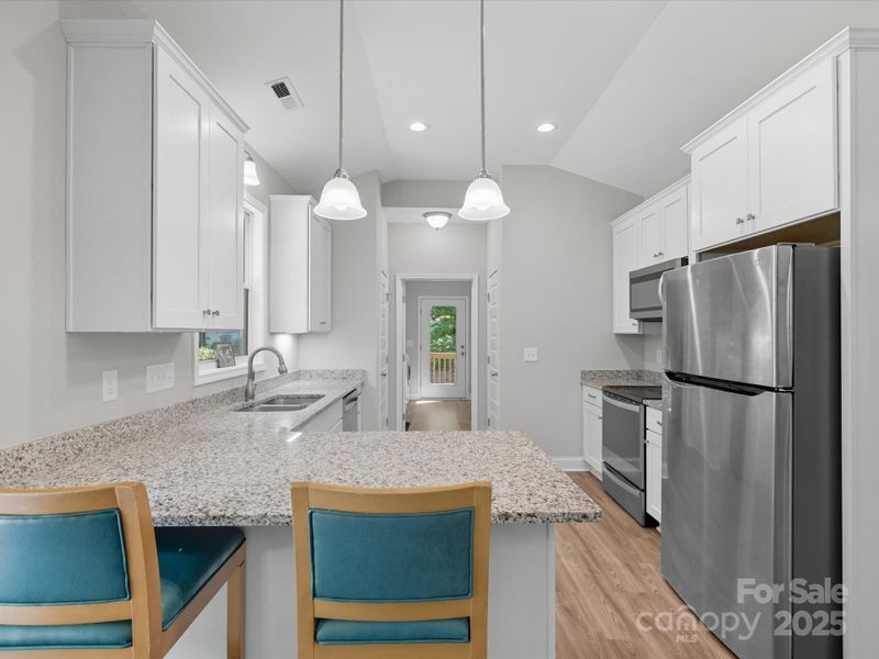 Furnished interior view inside a new home in , Wingate (Image 14).