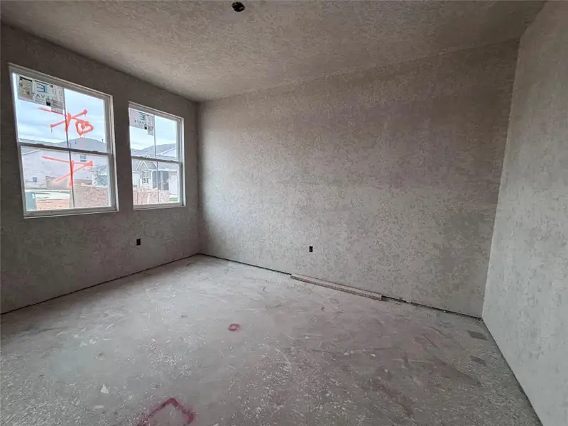 In-progress construction of a new home in The Colony 45s, Bastrop, TX (Image 9).