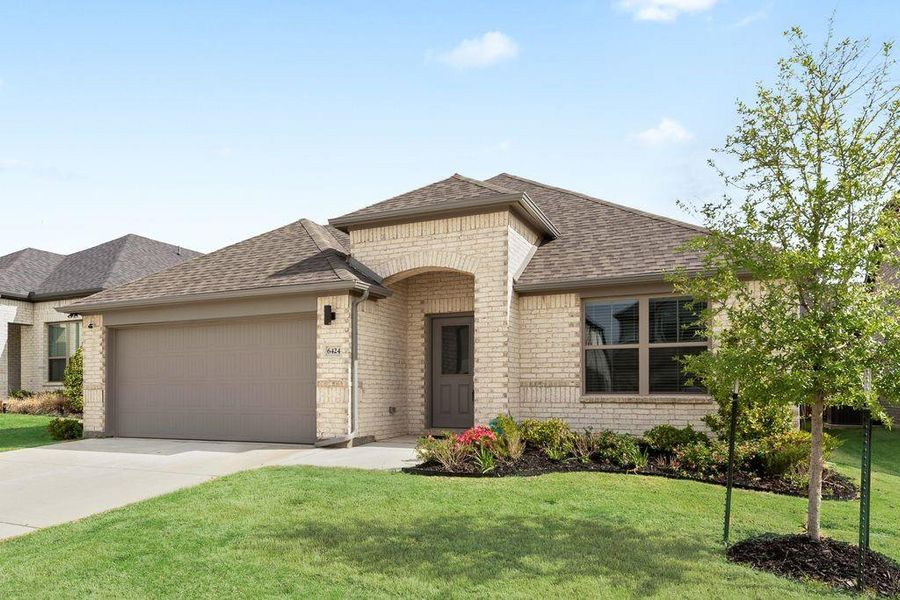 Front exterior of a new home in Tesoro at Chisholm Trail Ranch, Crowley, TX, highlighting curb appeal (Image 27).