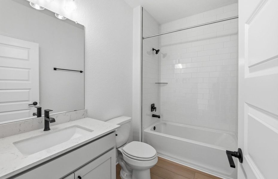 Furnished interior view inside a new home in West Cypress Hills, Spicewood (Image 8).