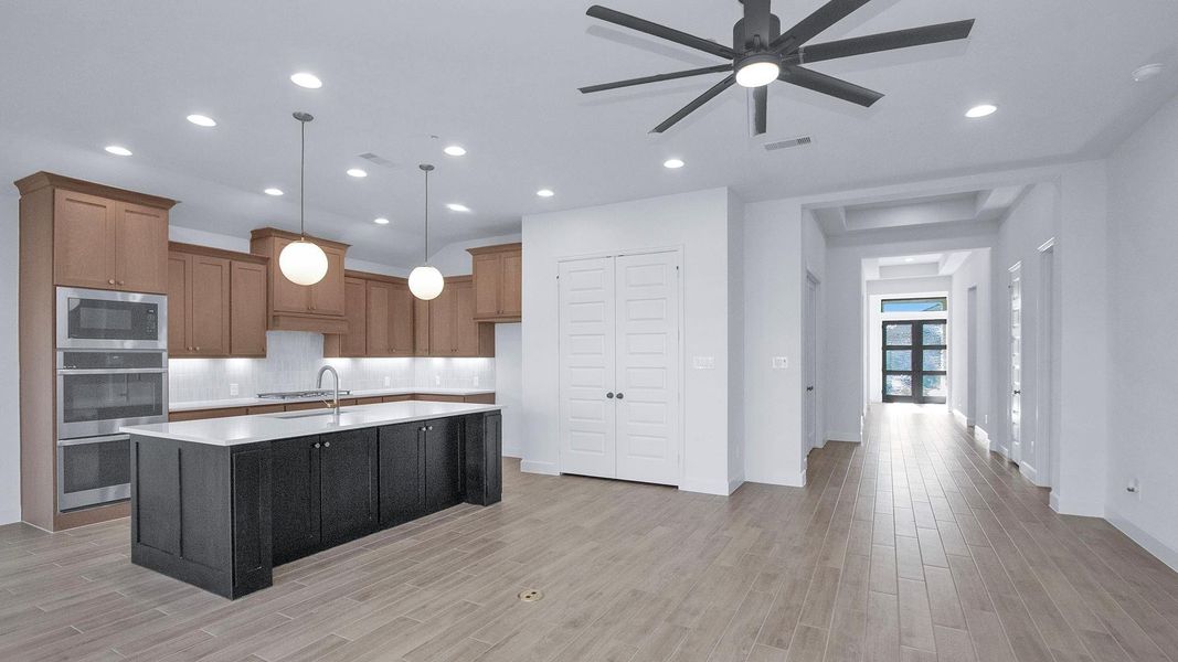 Furnished interior view inside a new home in Artavia, Conroe (Image 7).