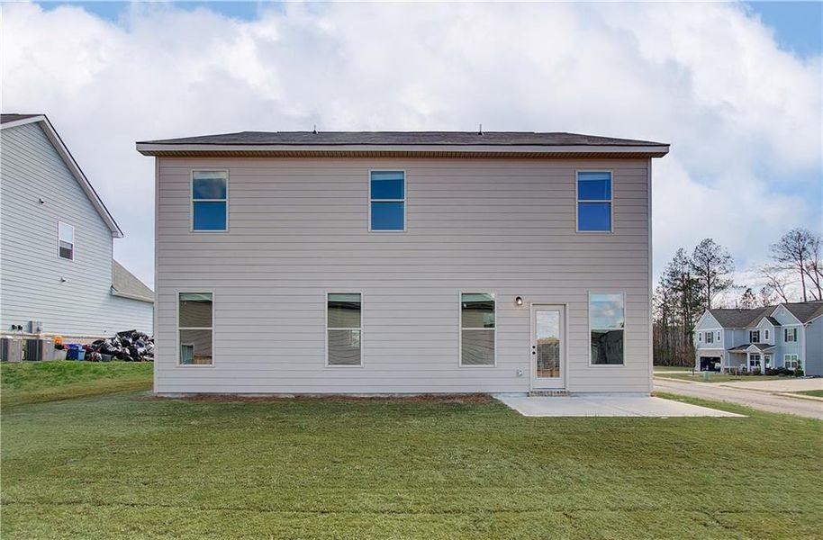 Exterior details and patio area of a home in Berkeley Lakes, Locust Grove (Image 3).