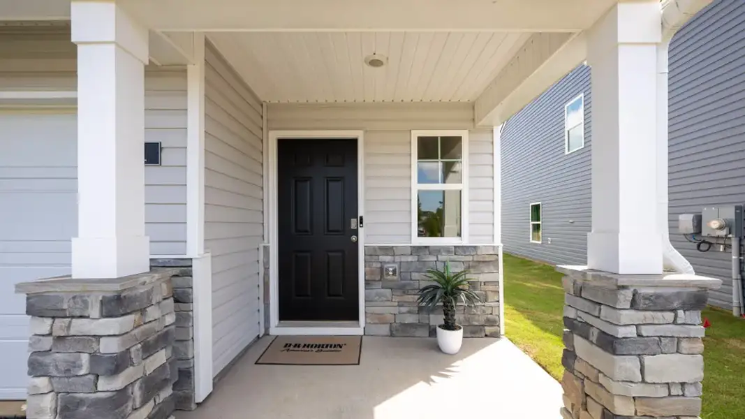 Exterior details and patio area of a home in Keebler Meadows, Johnson City (Image 2).