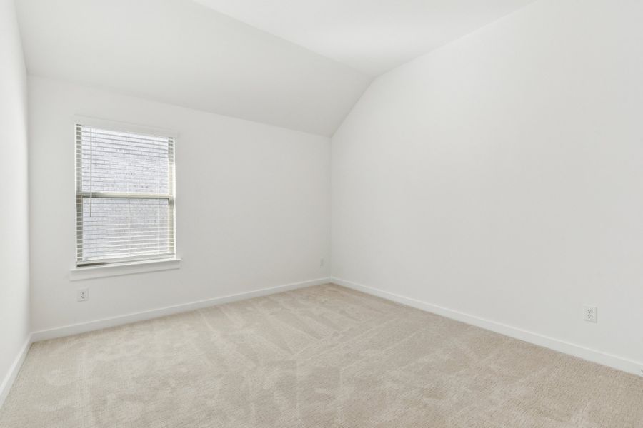 Bedroom in the Gilmour II home plan by Trophy Signature Homes – REPRESENTATIVE PHOTO