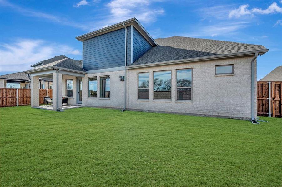 Exterior details and patio area of a home in South Pointe Manor Series, Mansfield (Image 26).