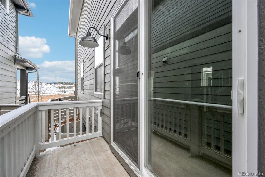 Exterior details and patio area of a home in The Villas Collection at Sterling Ranch, Littleton (Image 23).