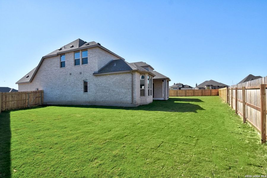 Exterior details and patio area of a home in Alsatian Oaks, Castroville (Image 20).