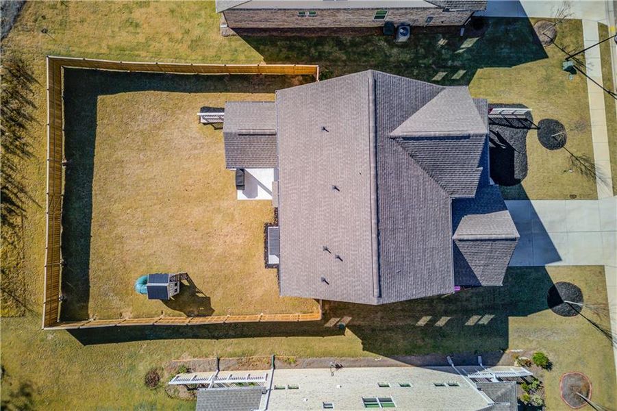 Exterior details and patio area of a home in Cambridge, Flowery Branch (Image 26).