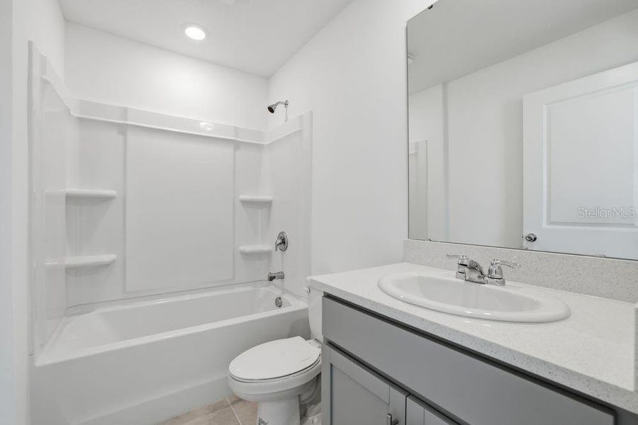 Furnished interior view inside a new home in The Towns at Firethorn, Parrish (Image 10).