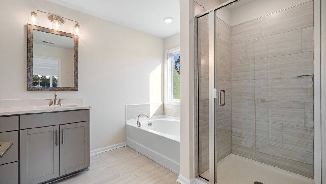 Representative furnished interior of a home built from the LONDON by D.R. Horton in Adams Glen, Greenville (Image 14).