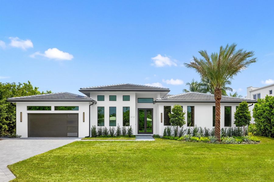 Front exterior of a new home in , Delray Beach, FL, highlighting curb appeal (Image 25).