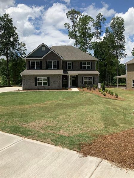 Front exterior of a new home in , Villa Rica, GA, highlighting curb appeal (Image 17). Front exterior of a new home in , Villa Rica, GA, highlighting curb appeal (Image 17).
