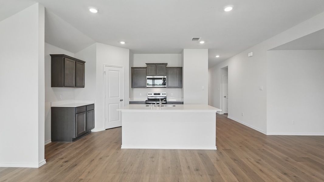 Furnished interior view inside a new home in Crane Crossing, Crandall (Image 5).