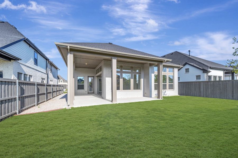 Exterior details and patio area of a home in Goodland – Classic Series, Grand Prairie (Image 4).