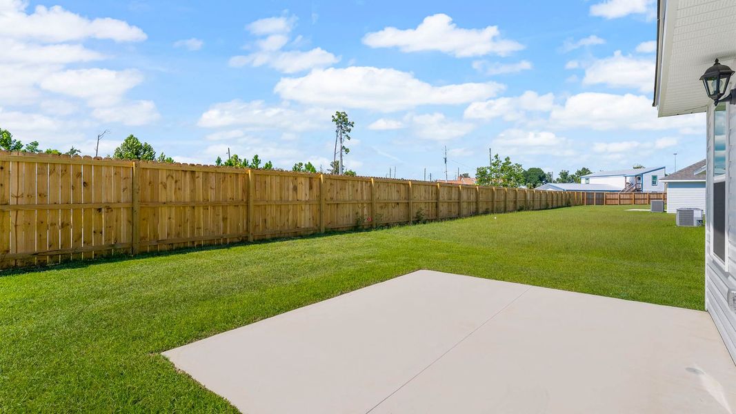 Front exterior of a new home in Park Place, Panama City, FL, highlighting curb appeal (Image 19). Front exterior of a new home in Park Place, Panama City, FL, highlighting curb appeal (Image 19).