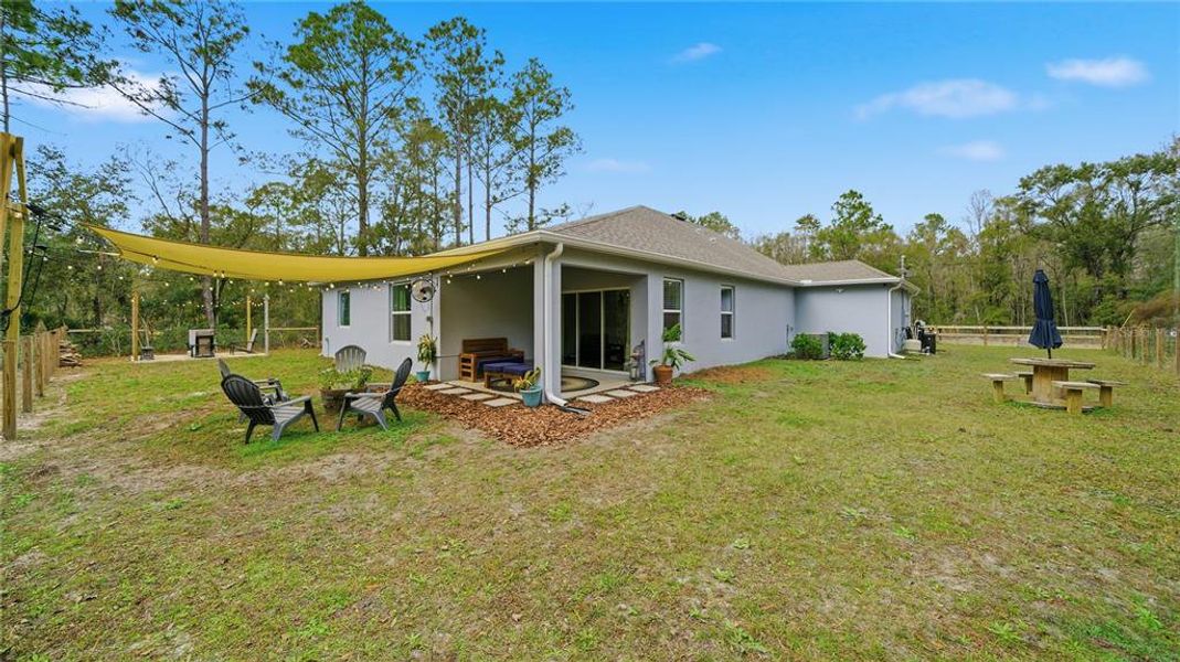 Exterior details and patio area of a home in Flagler Estates, Hastings (Image 22).