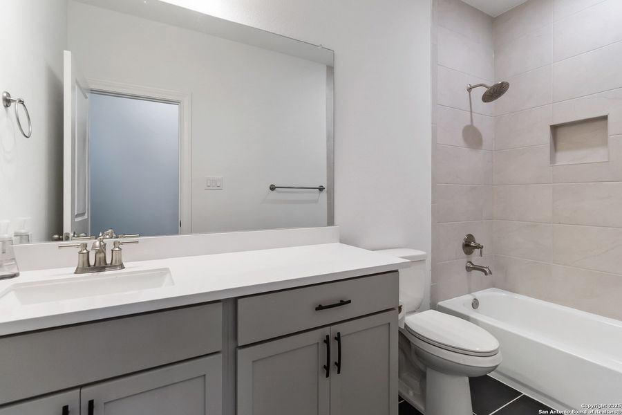 Furnished interior view inside a new home in Woodbridge Farms, La Vernia (Image 38).